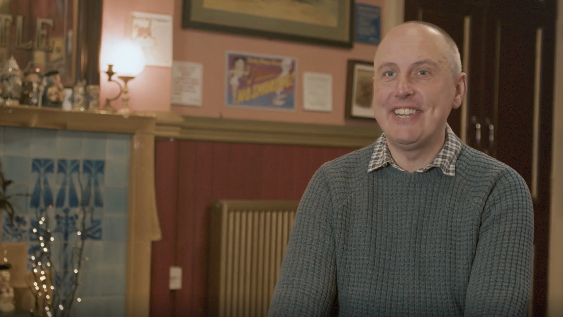 A man in a grey jumper 