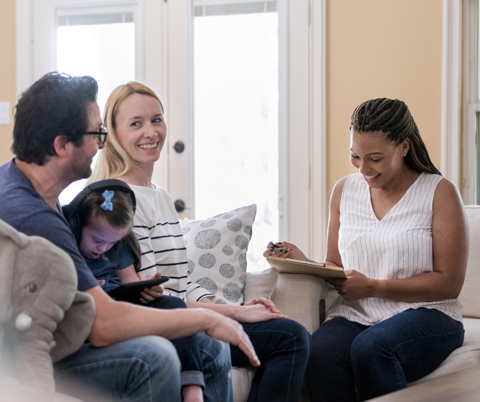 Link worker in a meeting with a family
