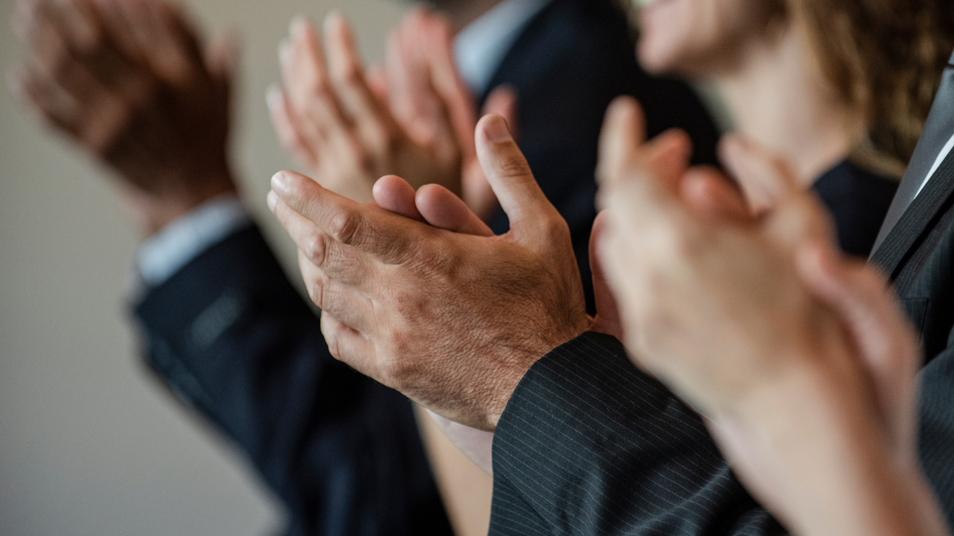 People clapping their hands