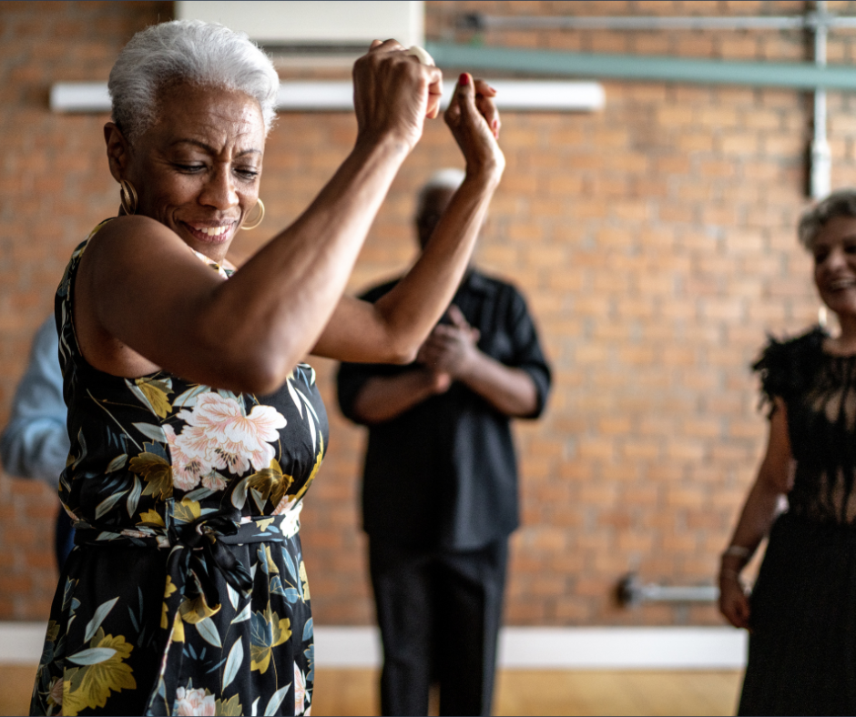 Woman smiling and dancing