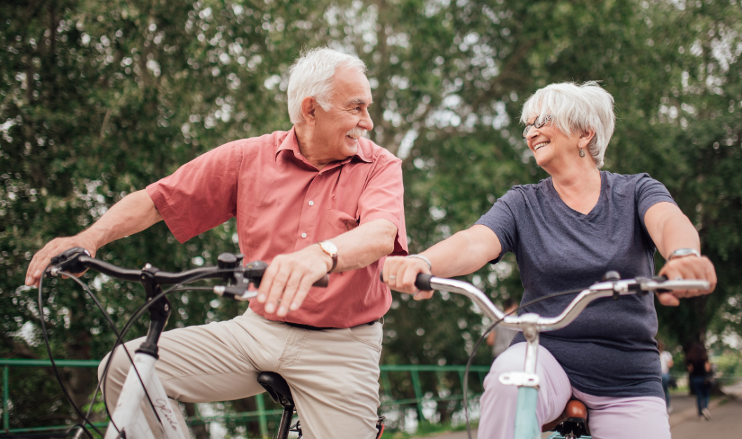 Old couple cycling